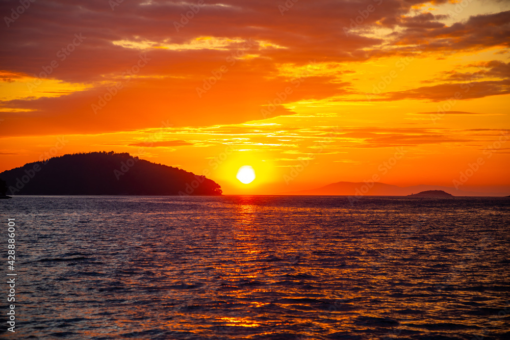 Beautiful orange sunset over sea in Croatia