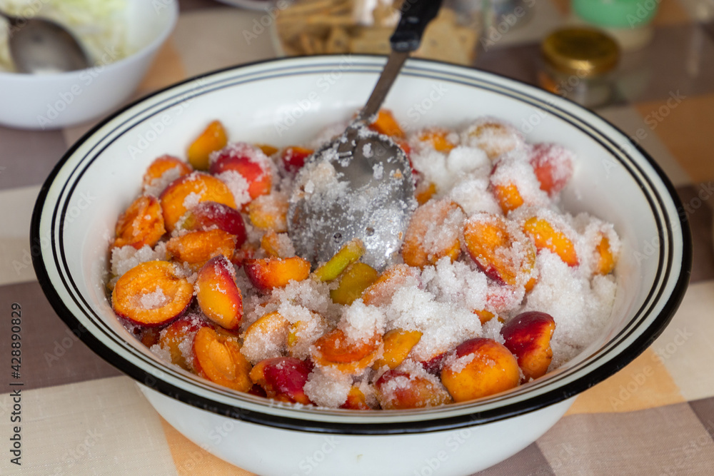 Apricot halves in sugar. Preparations for the winter. Fruit jam Apricot halves in sugar. Preparations for the winter. Fruit jam