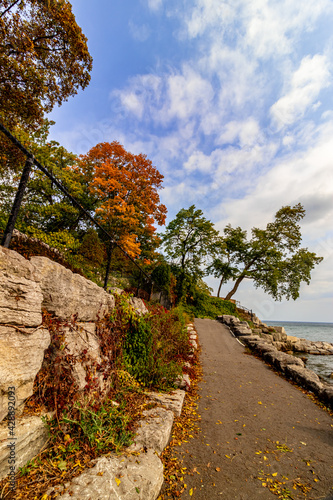 Slanting path leading up to the lake waters - Fall in Central Canada, ON