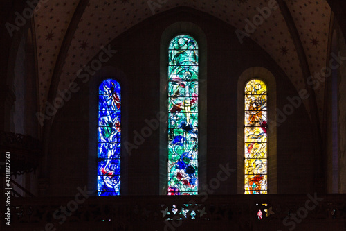 Zurich, Switzerland - April 19. 2021 : stained glass window of the Protestant church Fraumunster designed by Marc Chagall photo