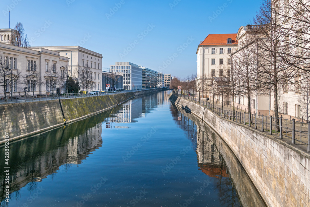 Obraz premium Berlin-Spandau shipping canal as seen from the Sandkrug bridge in Berlin, Germany