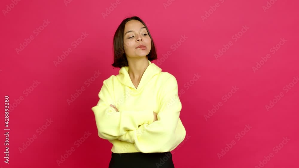Young latin woman having doubts and questioning an idea over isolated background