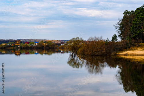 Spring landscape with the image of high water