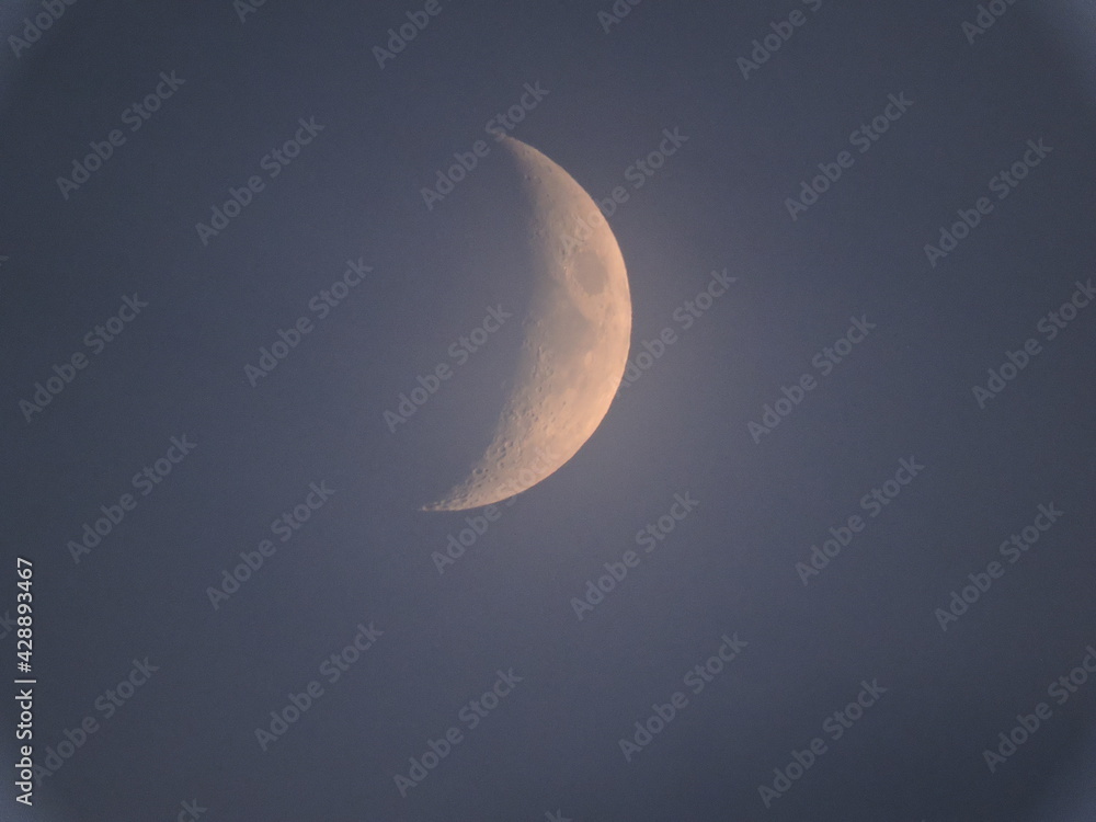 Multiple zoom, photo of the moon and the month with craters and structure. Summer night sky, blue and gray, isolated object, space background for design. Multiple zoom, photo of the moon and the month with craters and structure. Summer night sky, blue and gray, isolated object, space background for design.