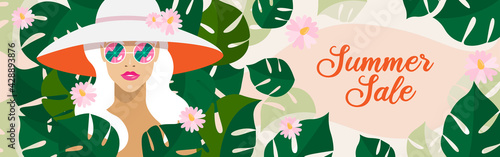 Portrait of blonde woman with long hair and summer wide-brimmed hat. Summer sale long banner concept or flyer in tropical style with palm leaves monstera and fashion model girl in sunglasses. Vector
