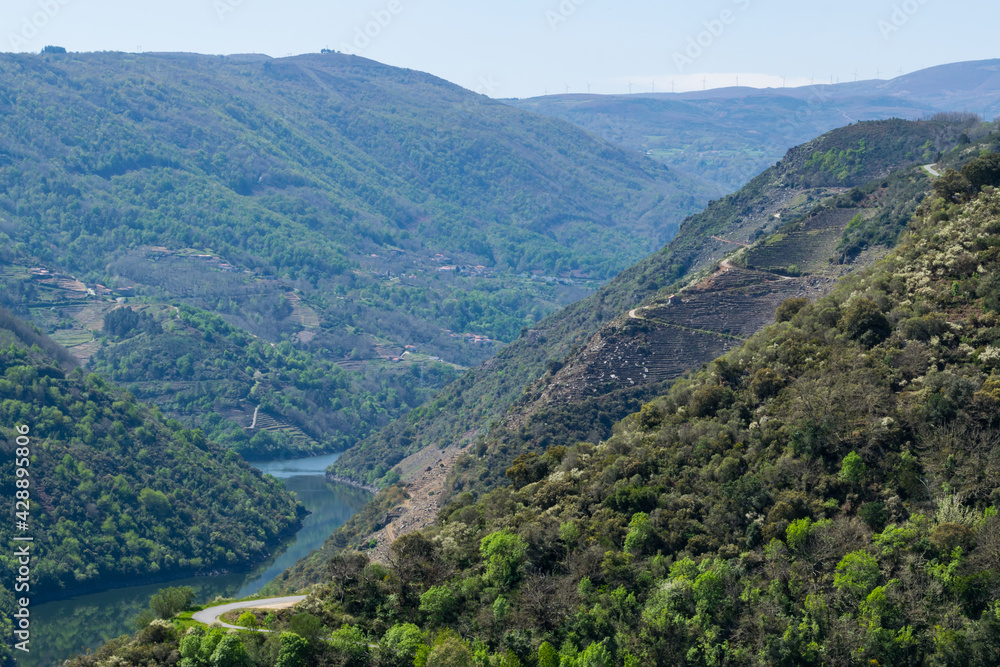 Sil river canyon between mountains in Ribeira Sacra