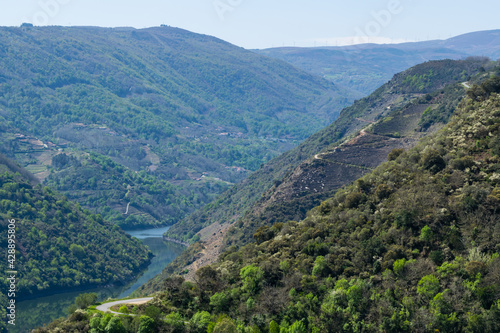 Sil river canyon between mountains in Ribeira Sacra