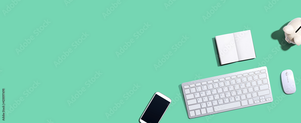 Computer keyboard and a piggy bank Computer keyboard and a piggy bank