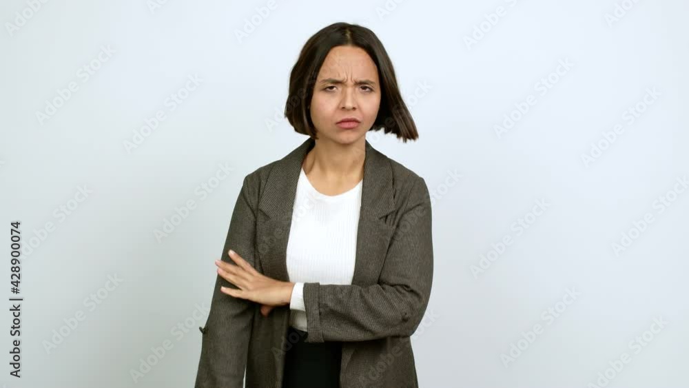 Young latin woman looking front over isolated background Young latin woman looking front over isolated background