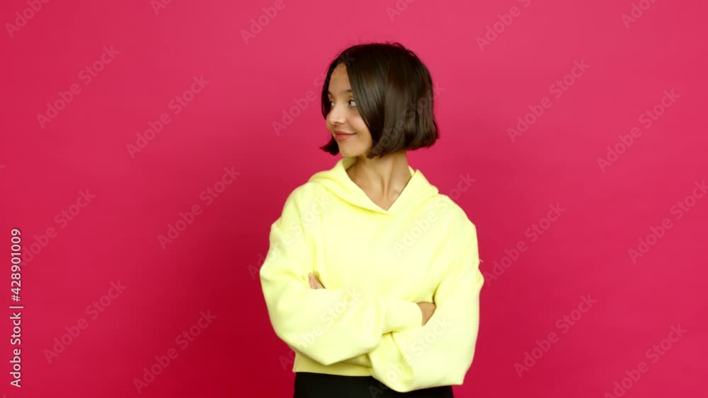 Young latin woman looking side over isolated background Young latin woman looking side over isolated background
