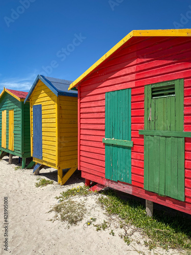 Famous colorful beach houses in Muizenberg near Cape Town, South Africa. © A. Emson