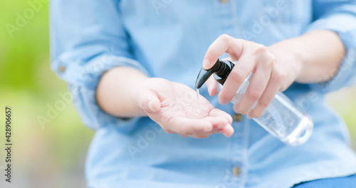 woman use hand sanitizer gel