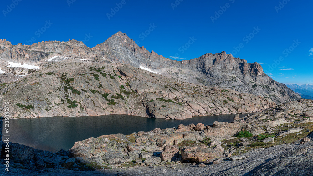 Panorama of Frozen Lake in Rocky Mountain National Park, Colorado, USA