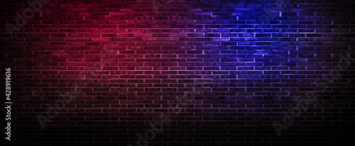 Leinwand Poster Black brick wall background rough concrete with neon lights and glowing lights