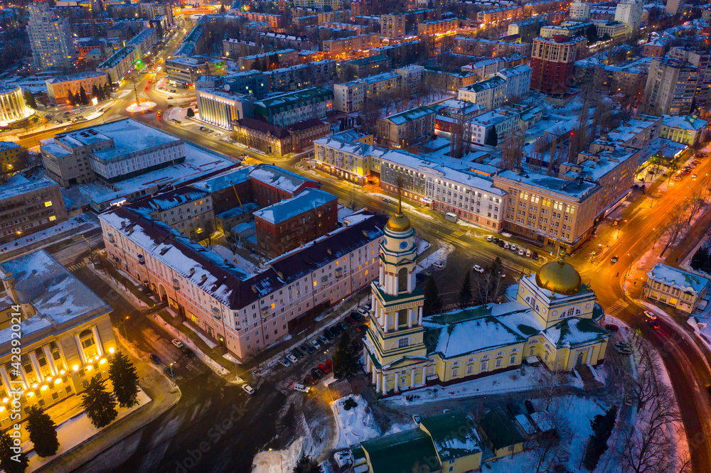 Top view on a winter Christ-Nativity Cathedral in the city center and residential quarters evening in Lipetsk, Russia