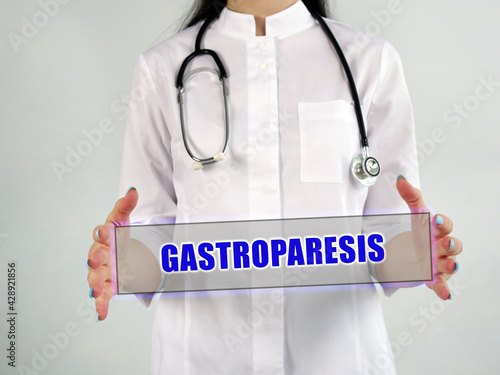 Healthcare concept meaning GASTROPARESIS with sign on the sheet. photo