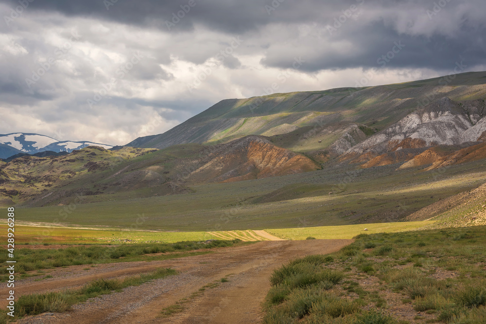 road steppe mountains clouds sky summer