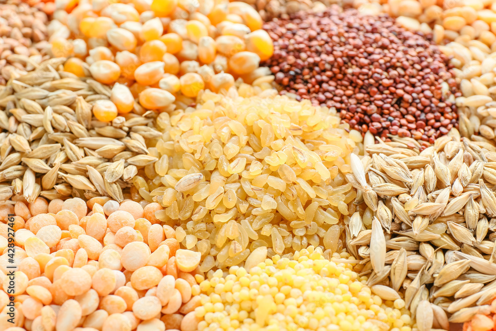 Heap of different cereals and legumes as background Heap of different cereals and legumes as background