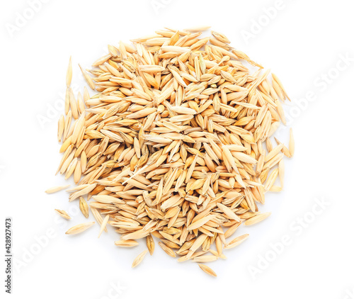 Heap of dry oats on white background