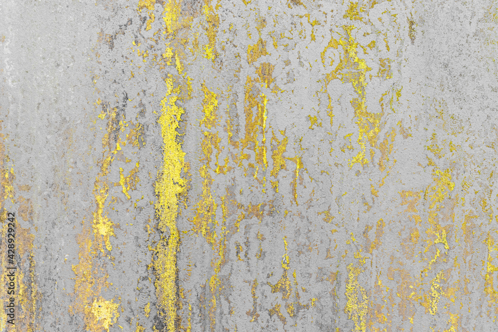 Grungy concrete and cement wall with peeling yellow paint. Texture background. Grungy concrete and cement wall with peeling yellow paint. Texture background.