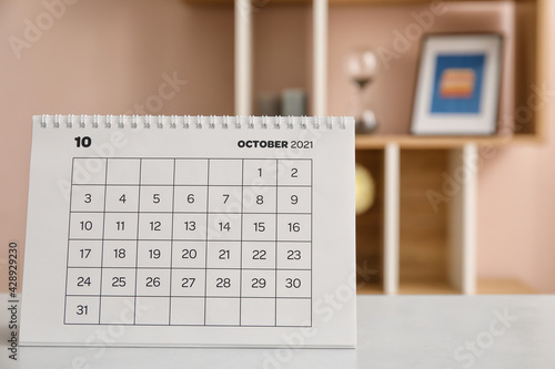 Flip paper calendar on tabl...