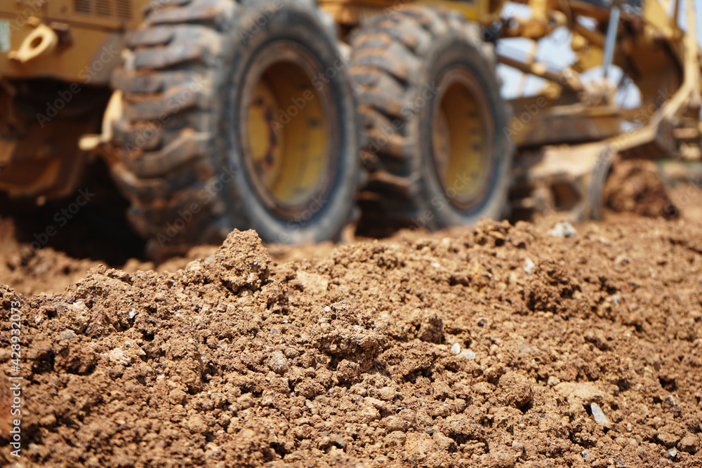 The image is blurred in the construction of asphalt road. The image is blurred in the construction of asphalt road.