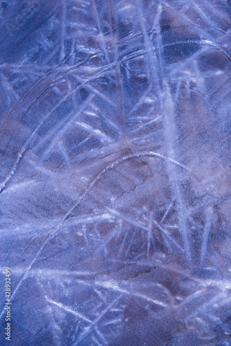 Ice structure. Abstract illustration in purple tones. Background, texture of frozen water. Frosty drawing on the window © dewessa