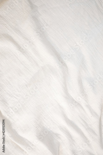 Fabric backdrop White linen canvas crumpled natural cotton fabric Natural handmade linen top view background Organic Eco textiles White Fabric texture