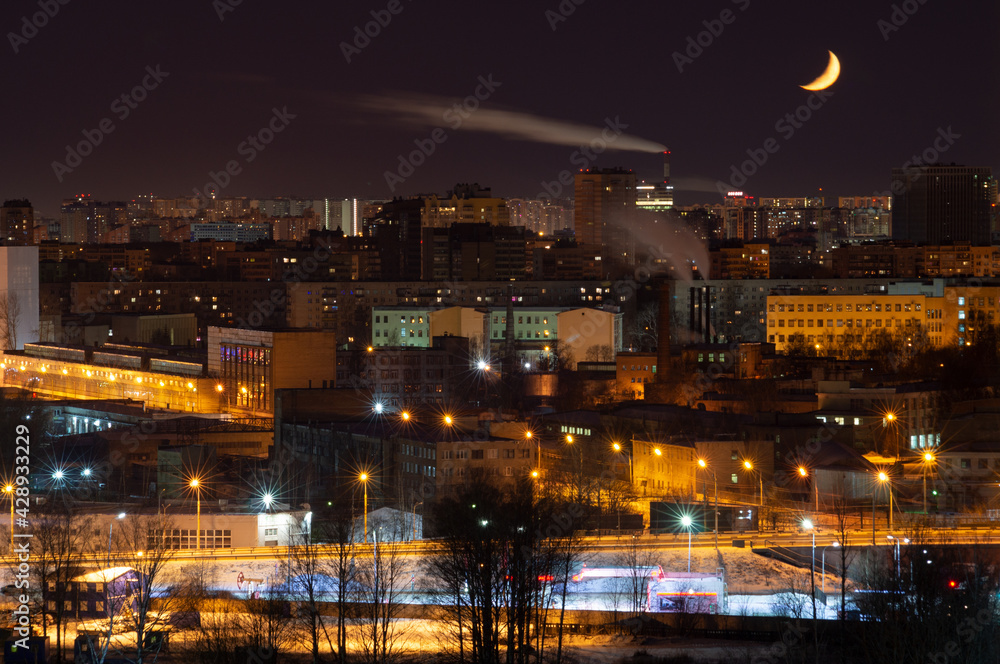 Fototapeta premium Night industrial city orange lights buildings
