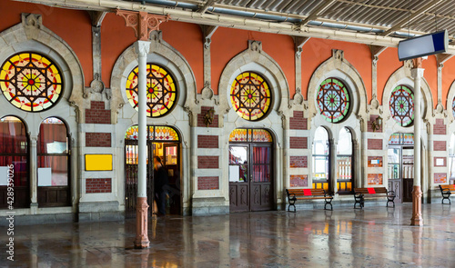 Architectural elements in Ottoman style decorating historic building of Sirkeci railway Terminal in Istanbul, Turkey photo