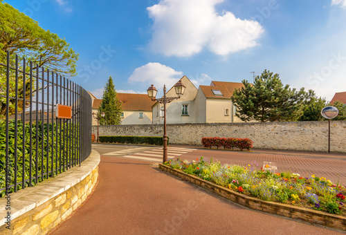 Fototapeta Naklejka Na Ścianę i Meble -  Picturesque small town street view in Roissy En France, Paris, France.
