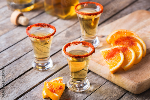 Cuadro en lienzo Mexican mezcal or mescal shot with chili pepper and orange