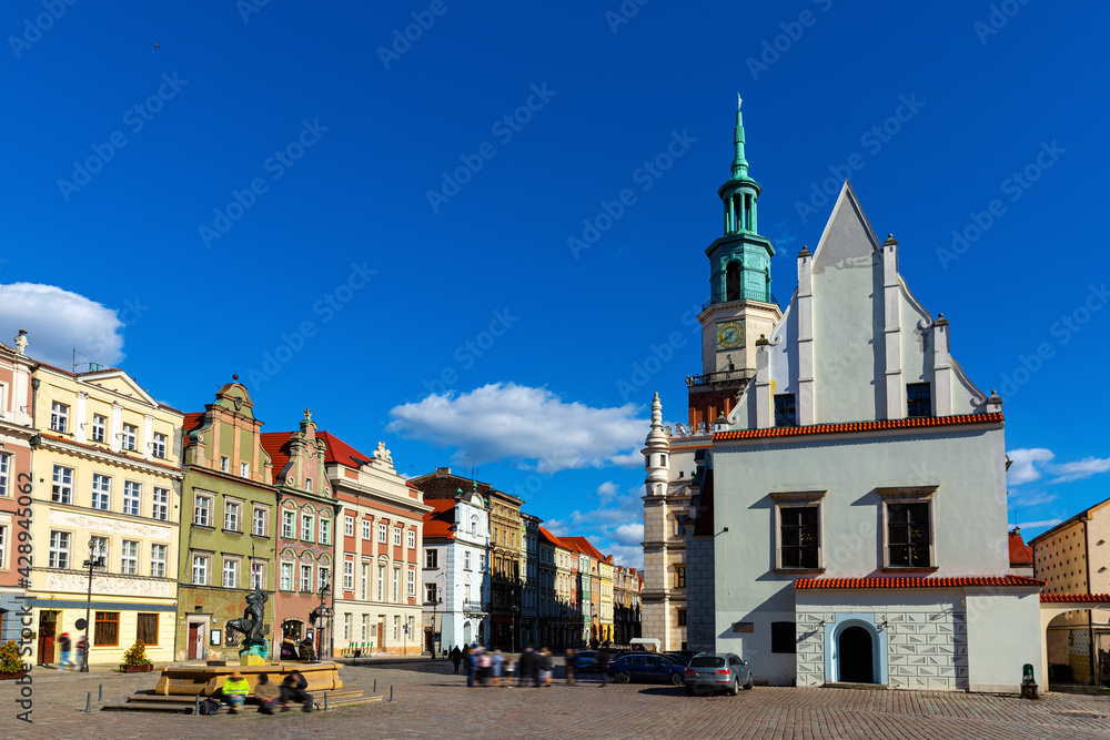 Fototapeta premium View of historic building of Weighing house and Town Hall in centre of Poznan Market Square in sunny spring day, Poland