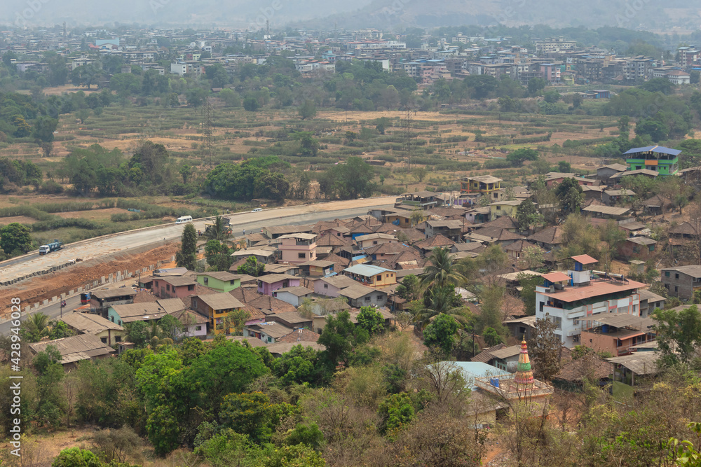 View of Gandharpale village and Mahad city from the caves, Mahad, Raigad, Maharashtra, India. View of Gandharpale village and Mahad city from the caves, Mahad, Raigad, Maharashtra, India.