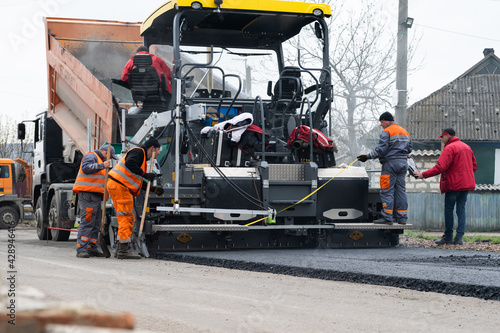 repair of an asphalt road with fresh asphalt