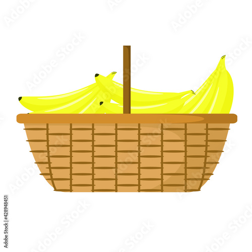 Wicker basket with ripe bananas on a white background