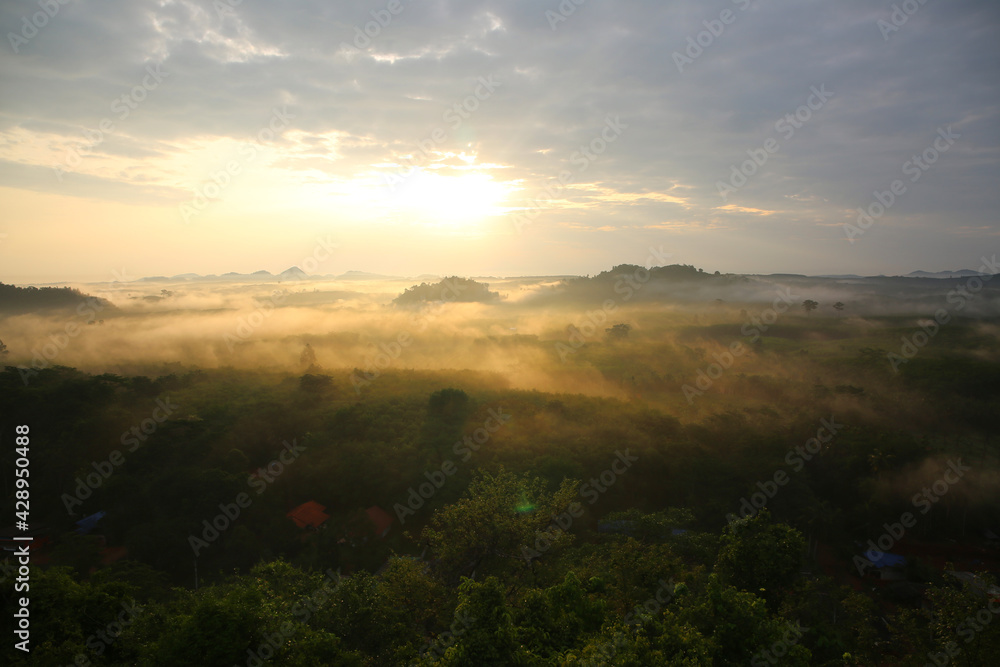sunrise over the mountains, Landscape view of Khao Na Nai Luang temple on peak mountain at Surat Thani Province, Southern of Thailand