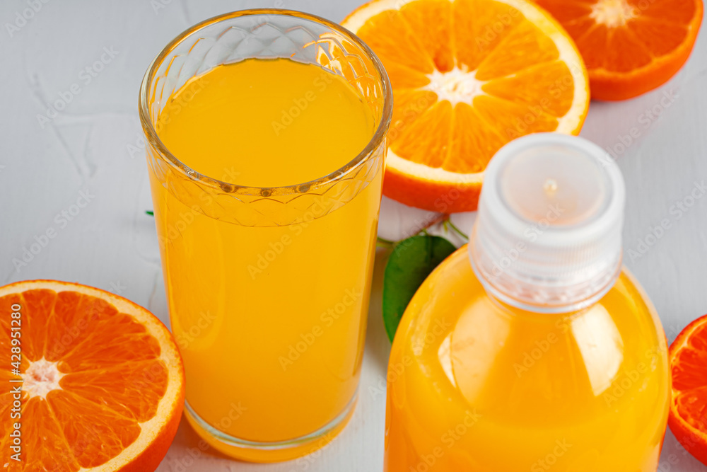 Orange juice cup on table close up Orange juice cup on table close up