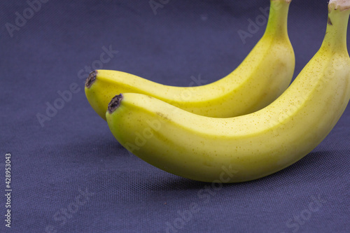 Photo of a banana on a blue background