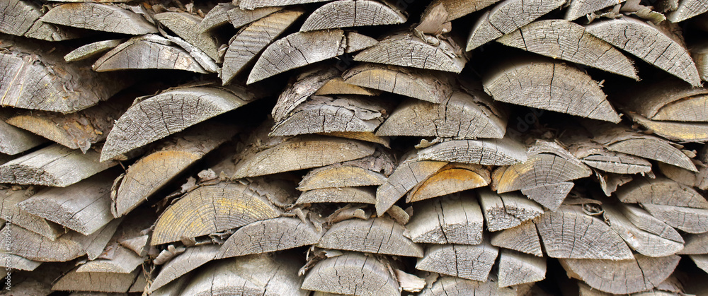 Old grayed boards are stacked on top of each other. Old grayed boards are stacked on top of each other.