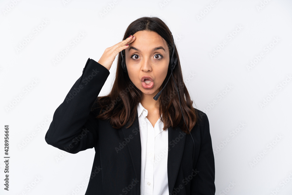 Young telemarketer woman isolated on white background has just realized something and has intending the solution Young telemarketer woman isolated on white background has just realized something and has intending the solution