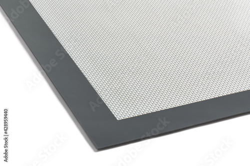 Fragment of multipurpose fiberglass silicone baking mat, cut out