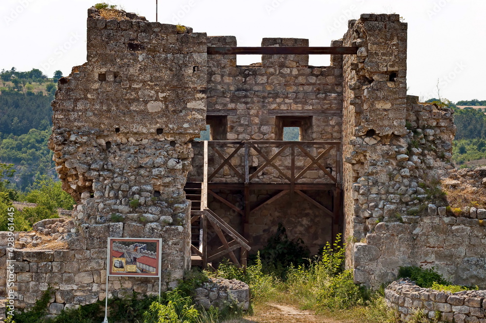 Exterior view of the ruins from Stone fortress tower from of the medieval town of Cherven in Bulgaria 
