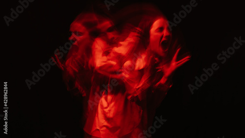 scary portrait of a ghost girl in a white shirt with a blur