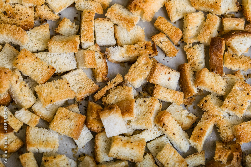 Dried bread with spices. White bread crackers.