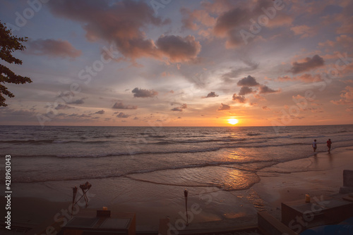 Romantic sky with colorful sunset over the sea background.