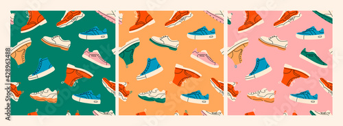 Various Shoes. Boots, sport shoes, sneakers, hiking footwear and other shoes for training. Men's and women's footwear. Set of three Hand drawn Vector seamless Patterns. Wallpaper or wrapping paper