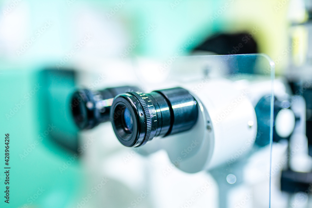 optometrist checking eyesight and vision correction on store. optometrist checking eyesight and vision correction on store.