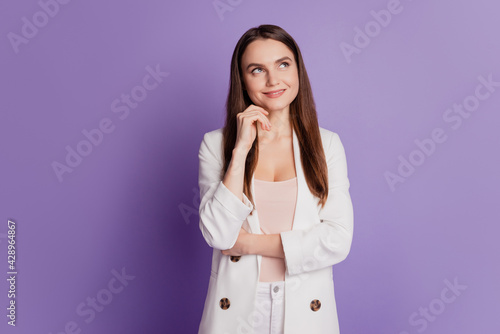 Close up portrait of lady finger chin look up empty space wear formal suit posing on violet wall