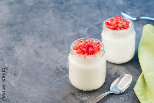 Natural Yogurt with granadine (healthy breakfast) photo